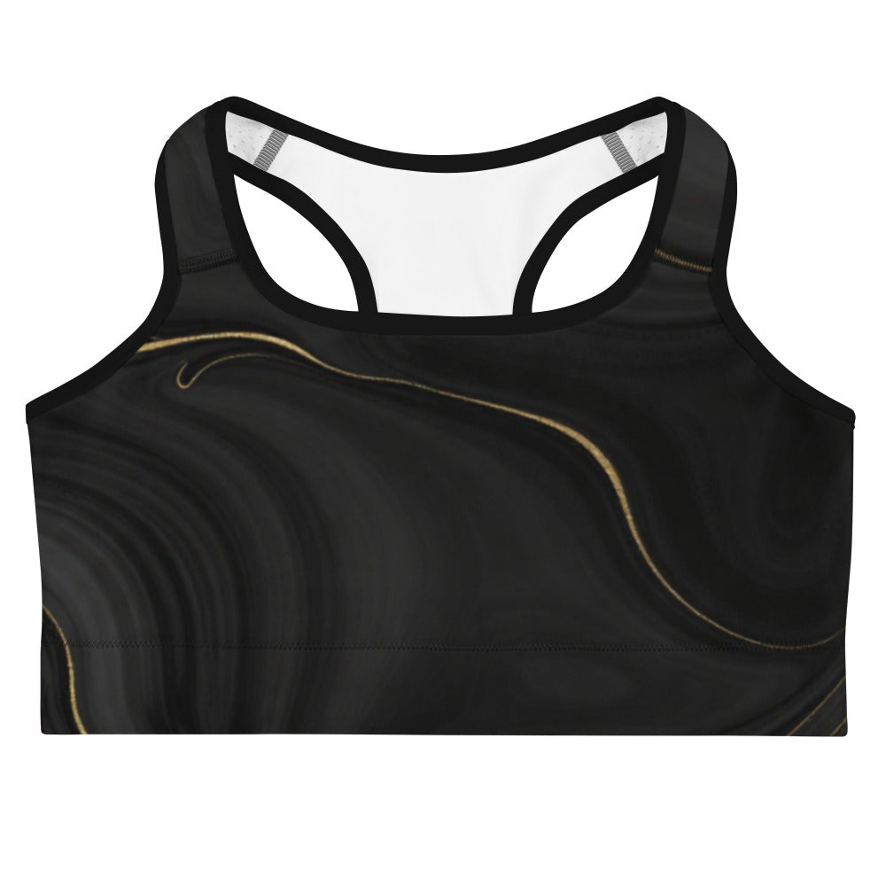 Black sports bra with gold accents on a white background